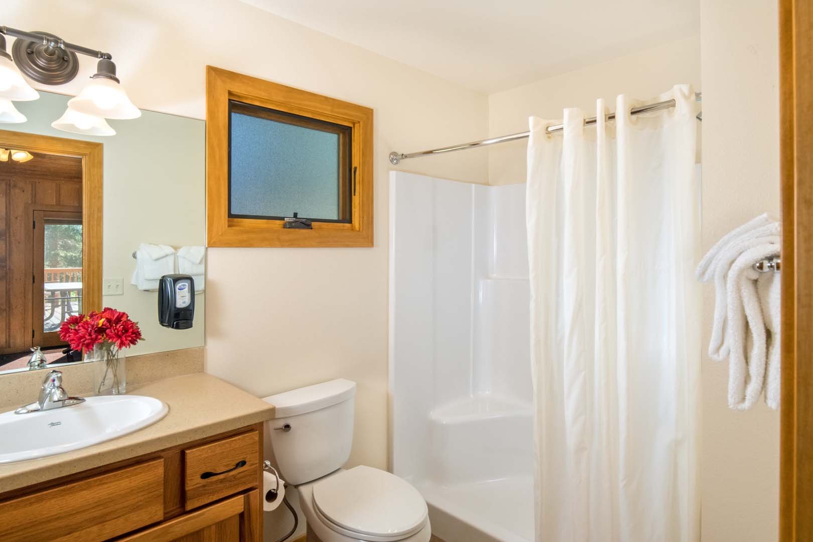 Bathroom with shower, toilet and skink