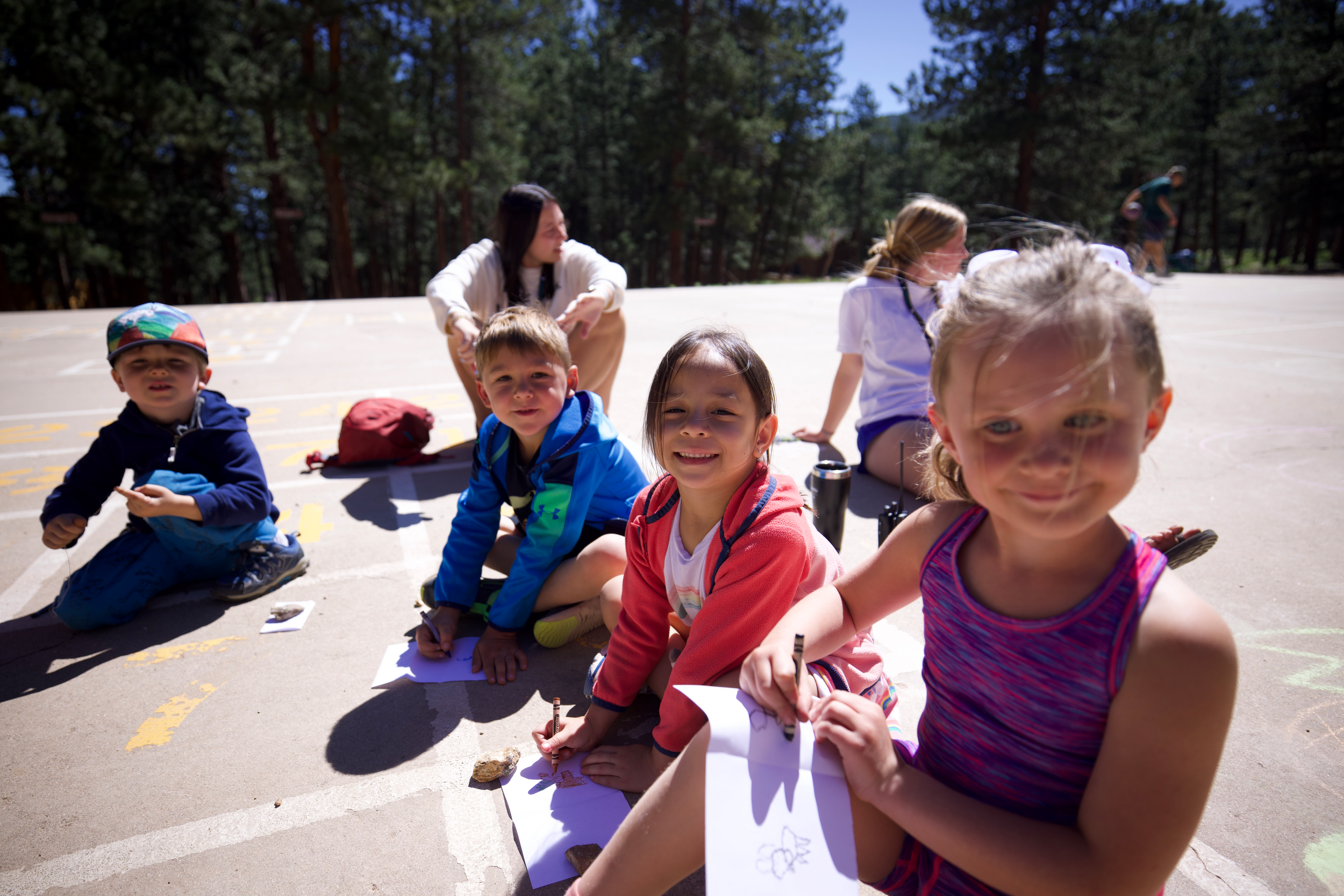 children drawing and laughing