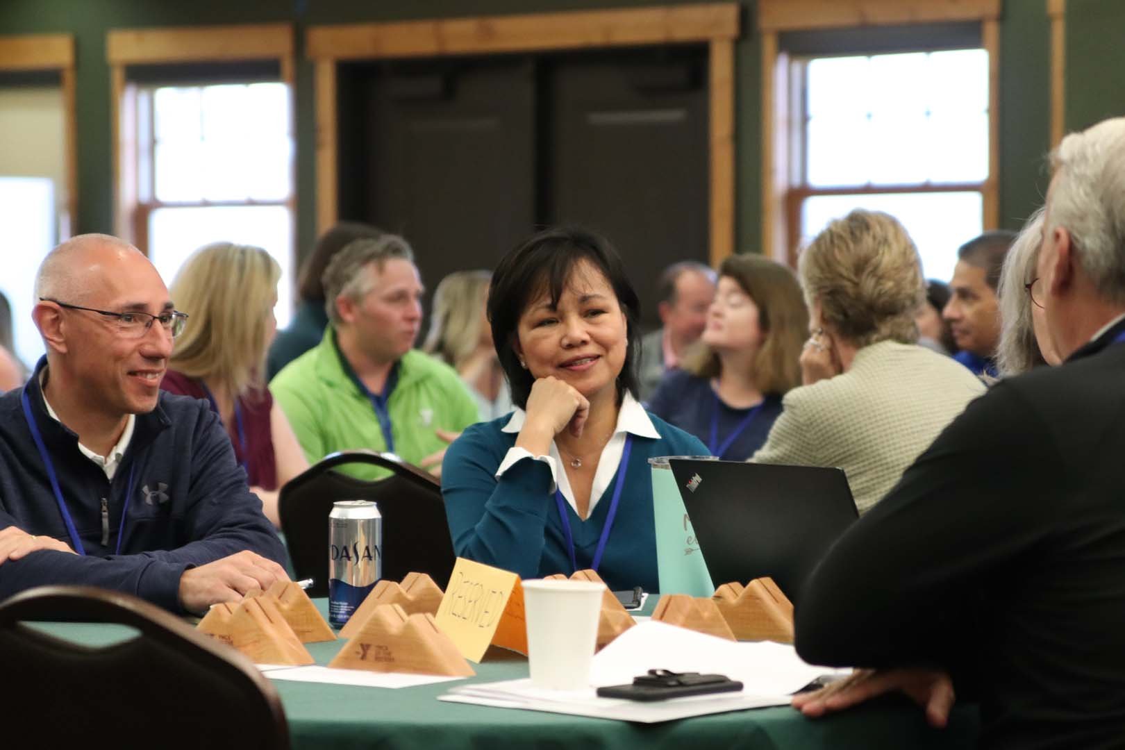 Group of people seated at a conference