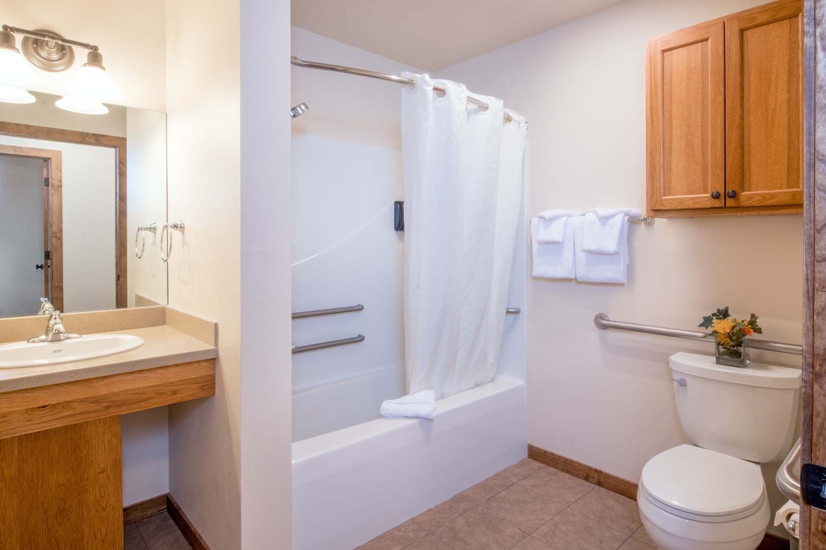 Bathroom with shower, toilet and skink