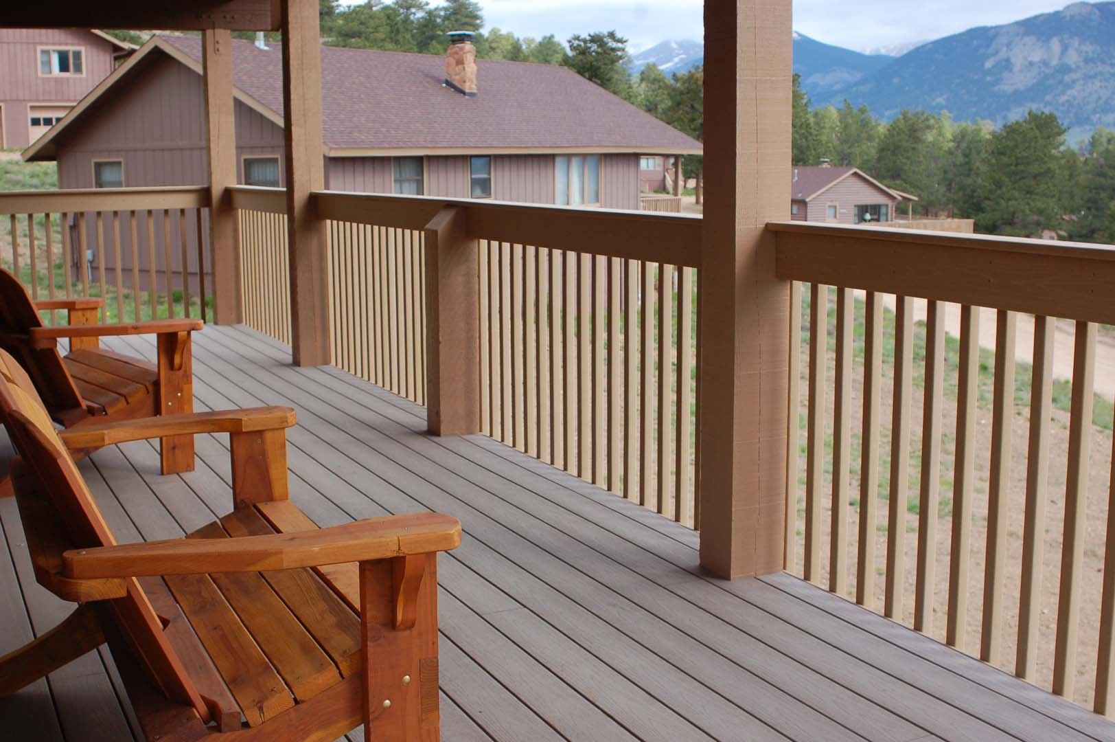 Outdoor patio with chairs overlooking the mountains