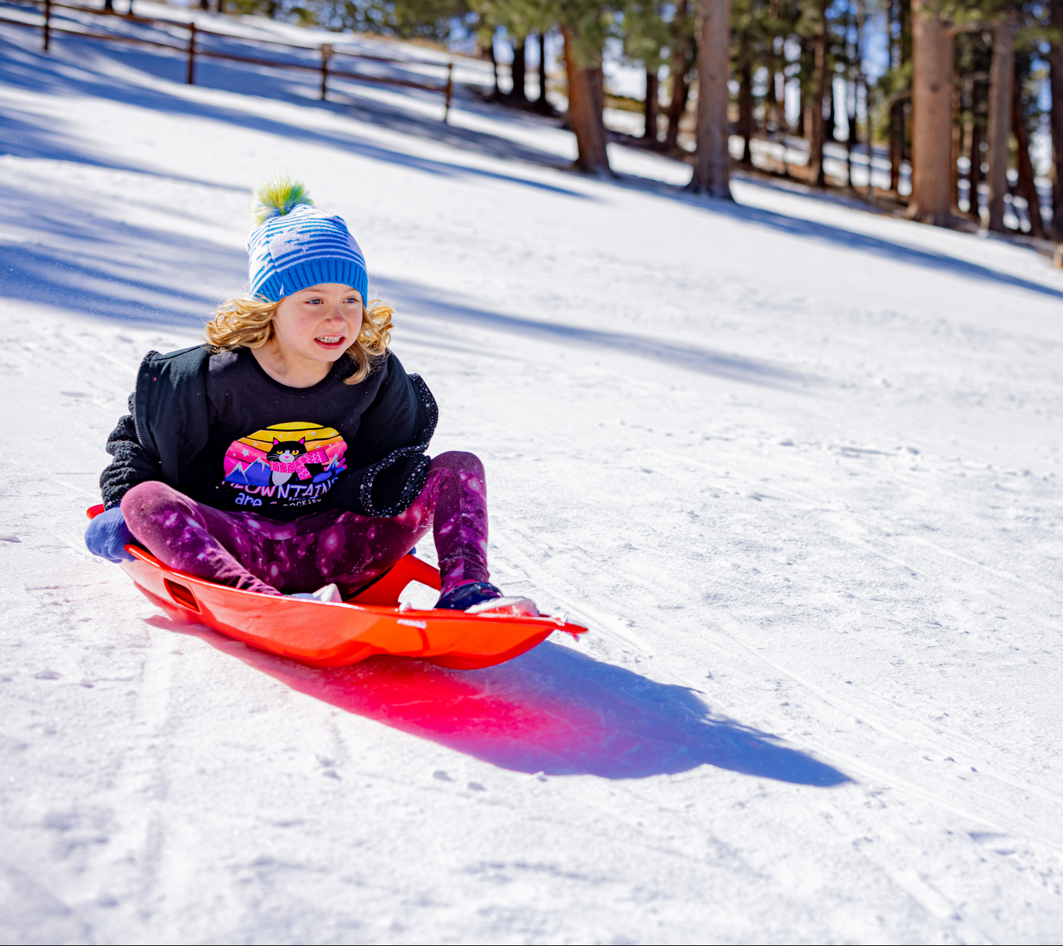 child sledding