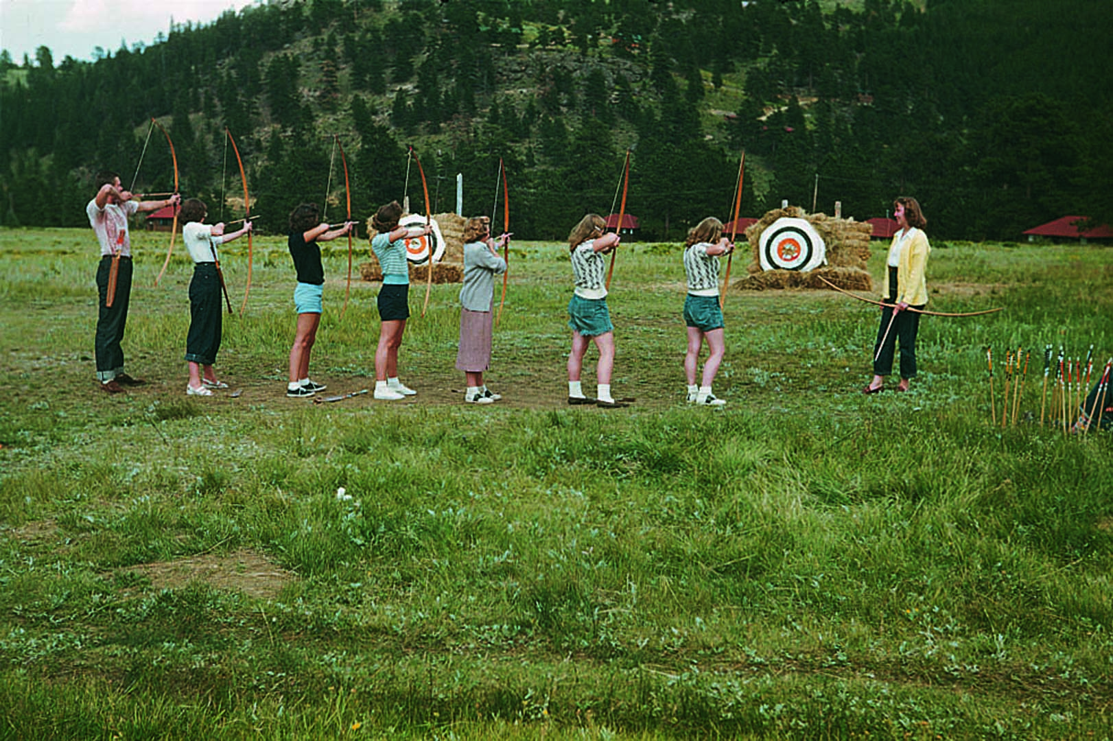 group of people doing archery