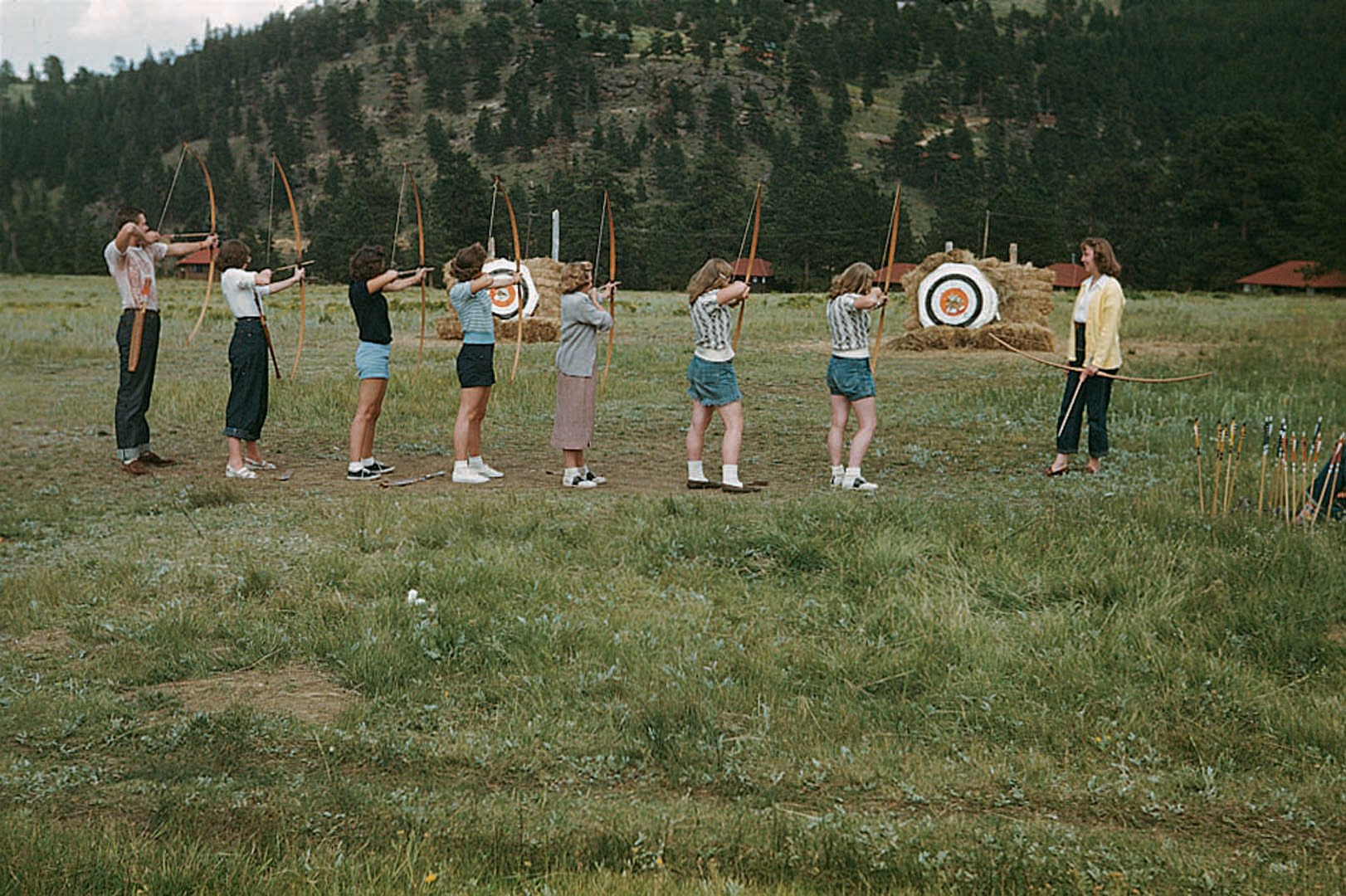 group of people doing archery