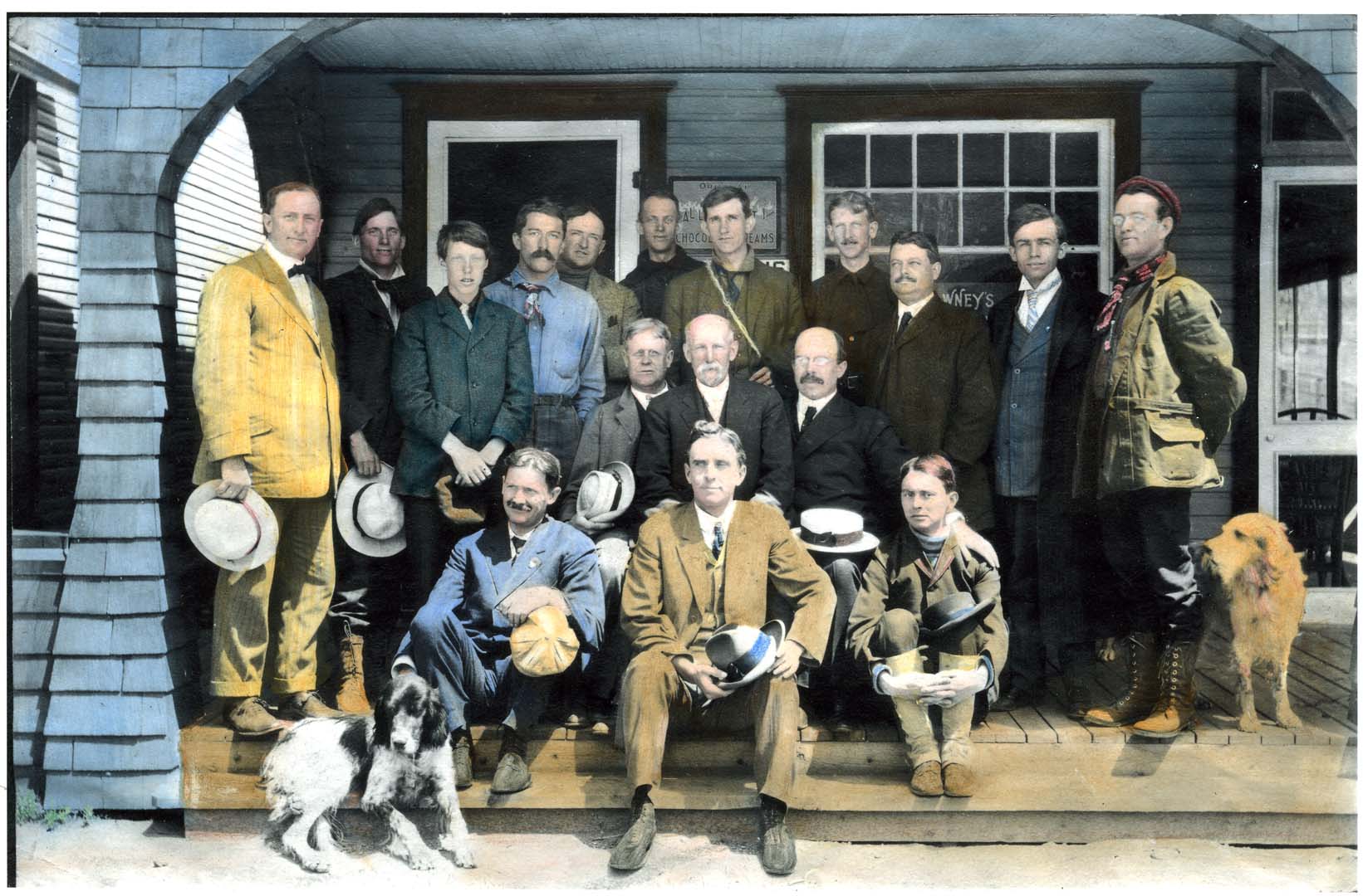 vintage photo of men standing on a porch