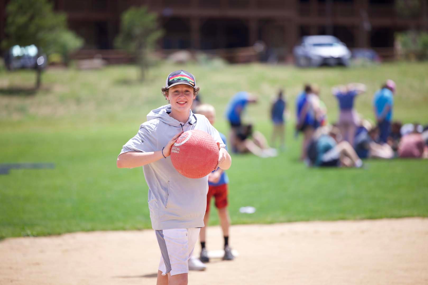 kid playing with ball