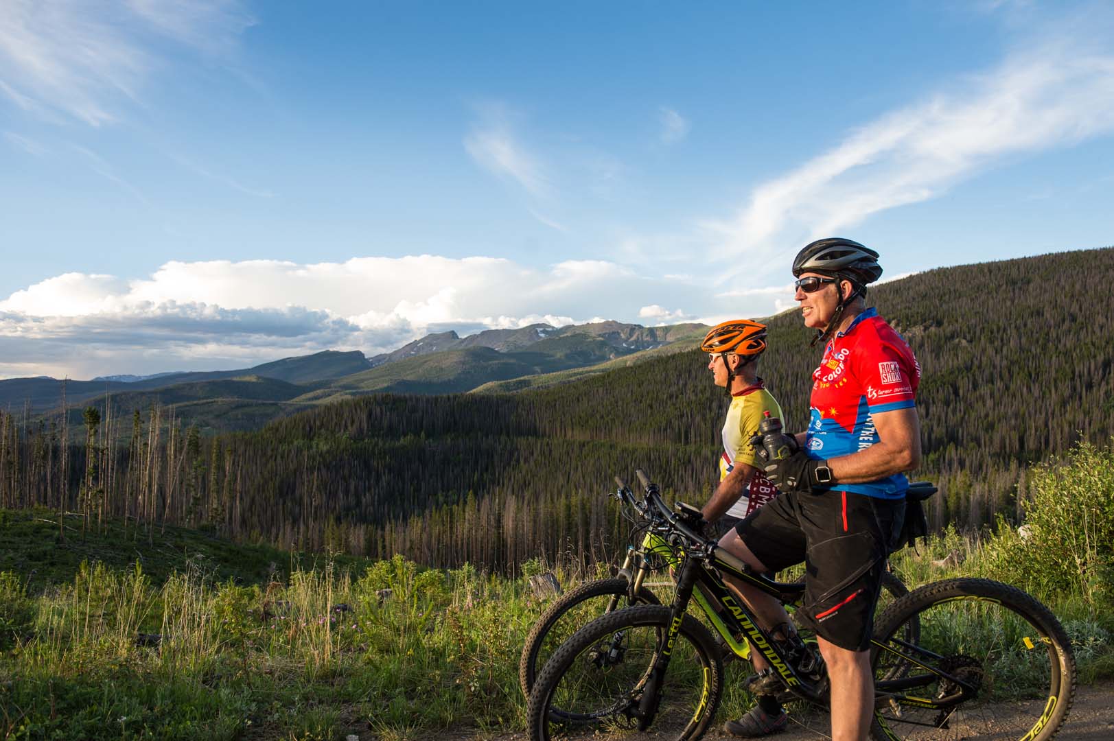 two men biking in the mountains