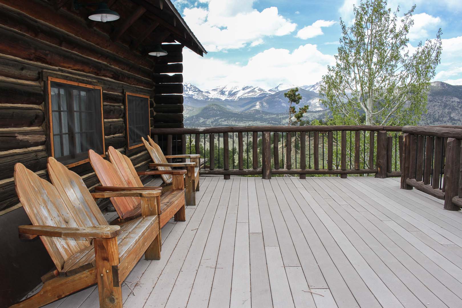 Patio with outdoor chairs and view of mountains