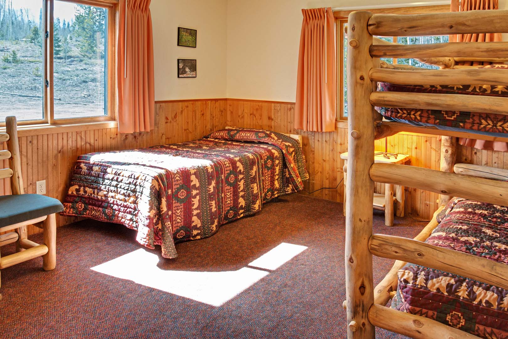 bedroom with single bed and one set of bunk beds