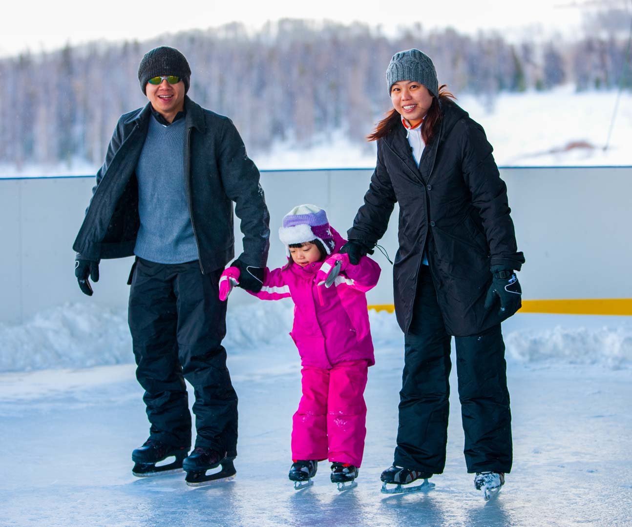 Family skating outside