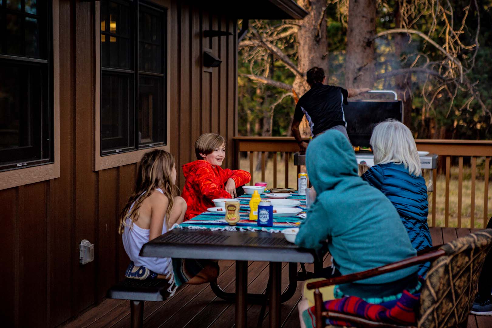 Family barbecuing on their patio