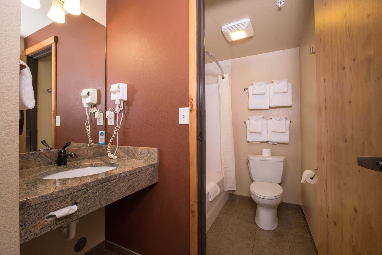 Bathroom with shower, toilet and sink