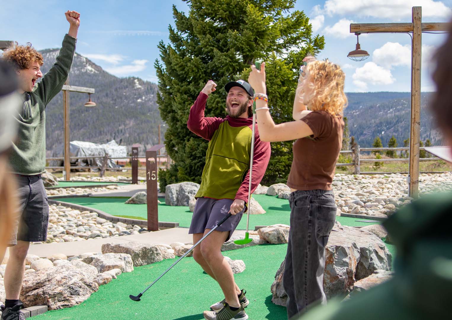 Group excited playing mini golf