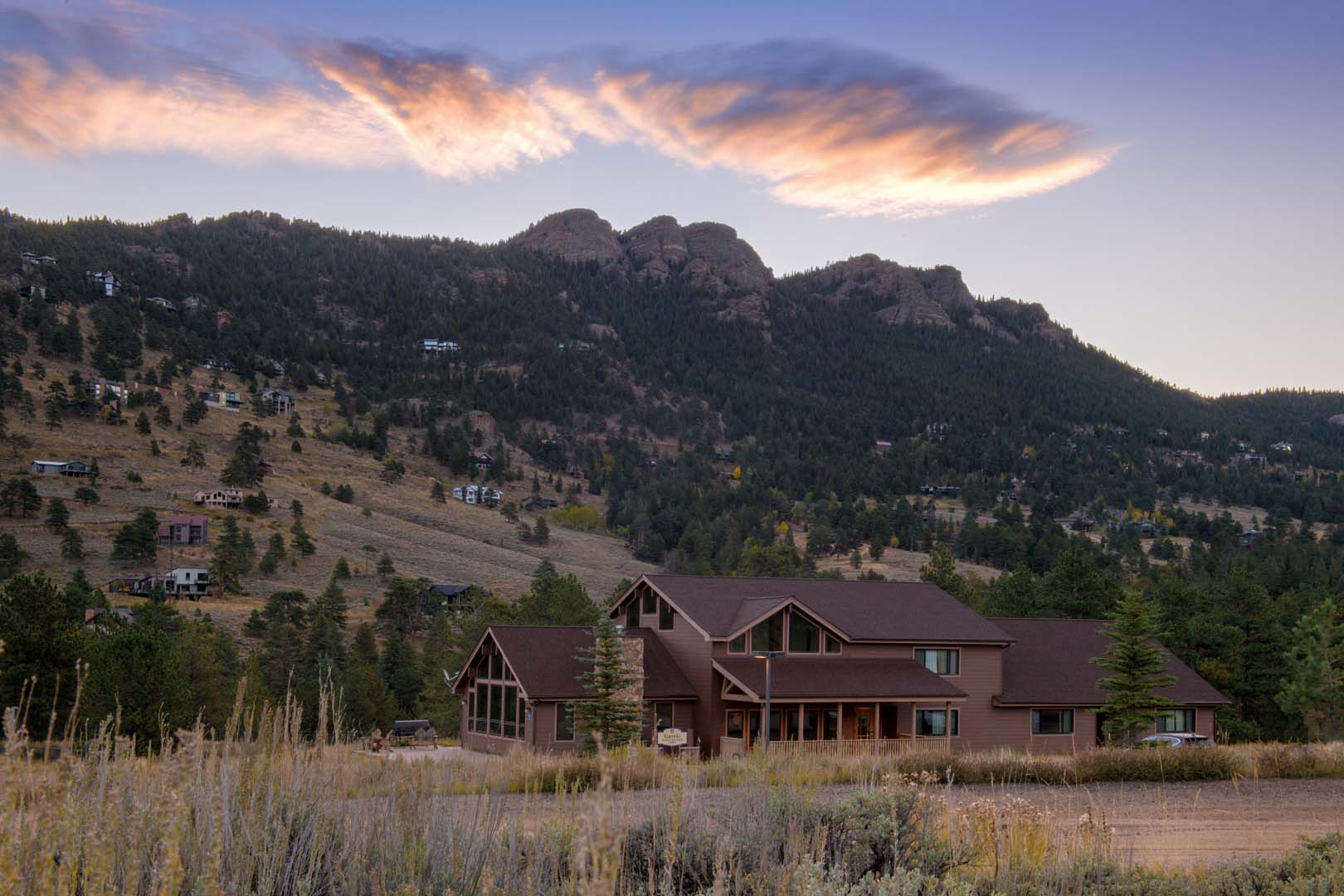 cabin with view of mountains