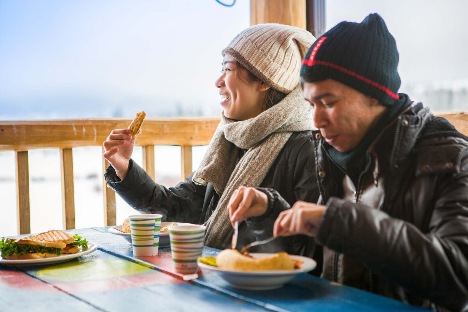 two people eating in a restaurant