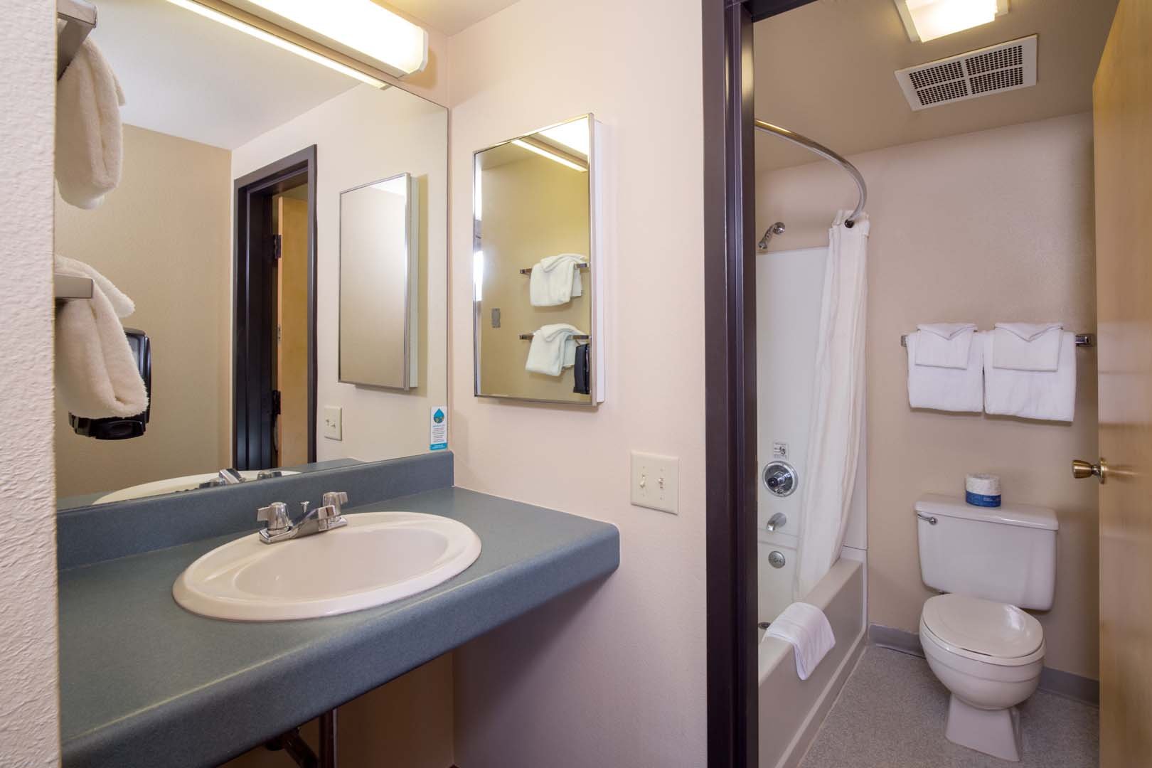 Bathroom with shower, toilet and sink