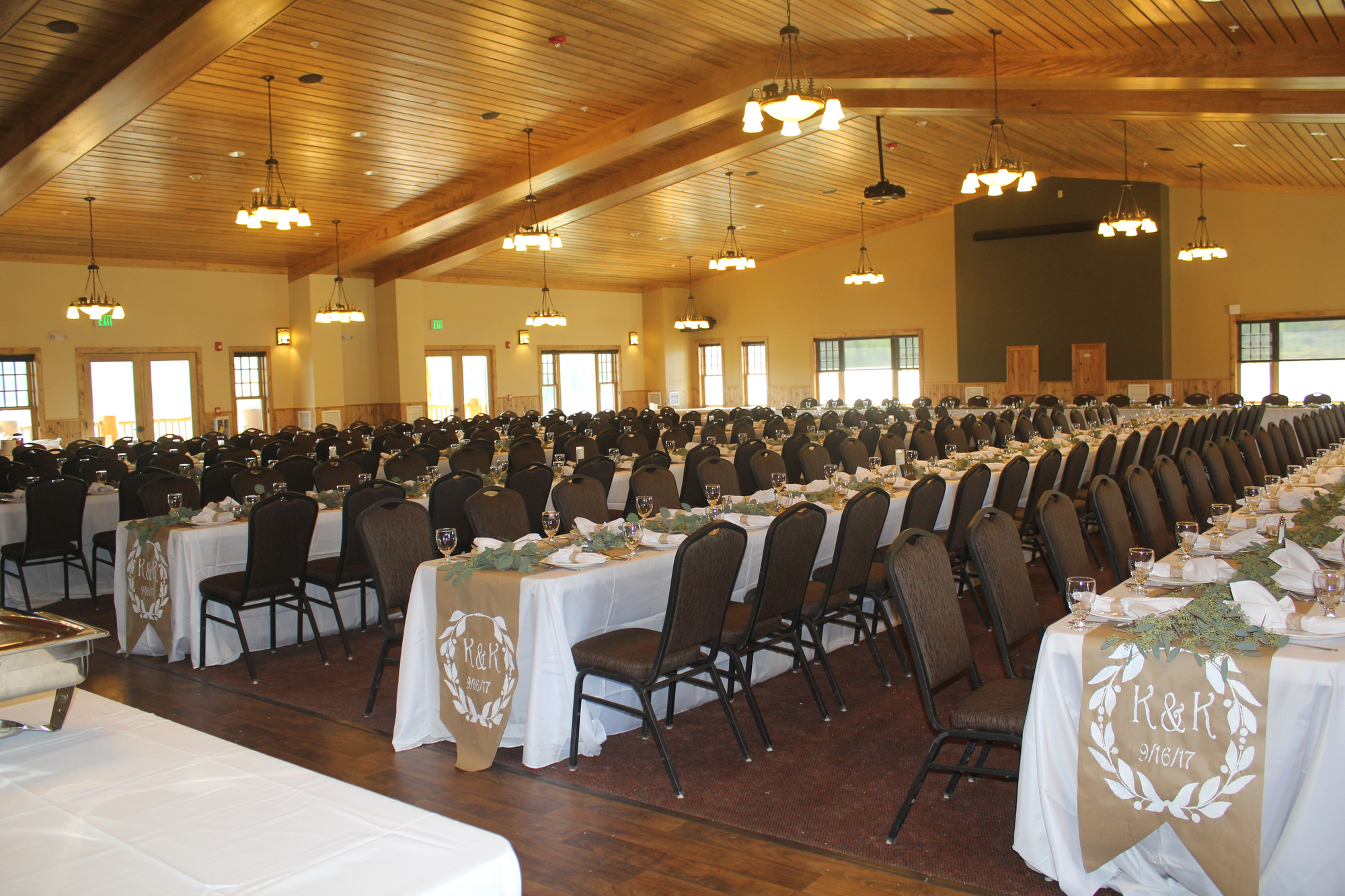 tables set up for a wedding in a hall