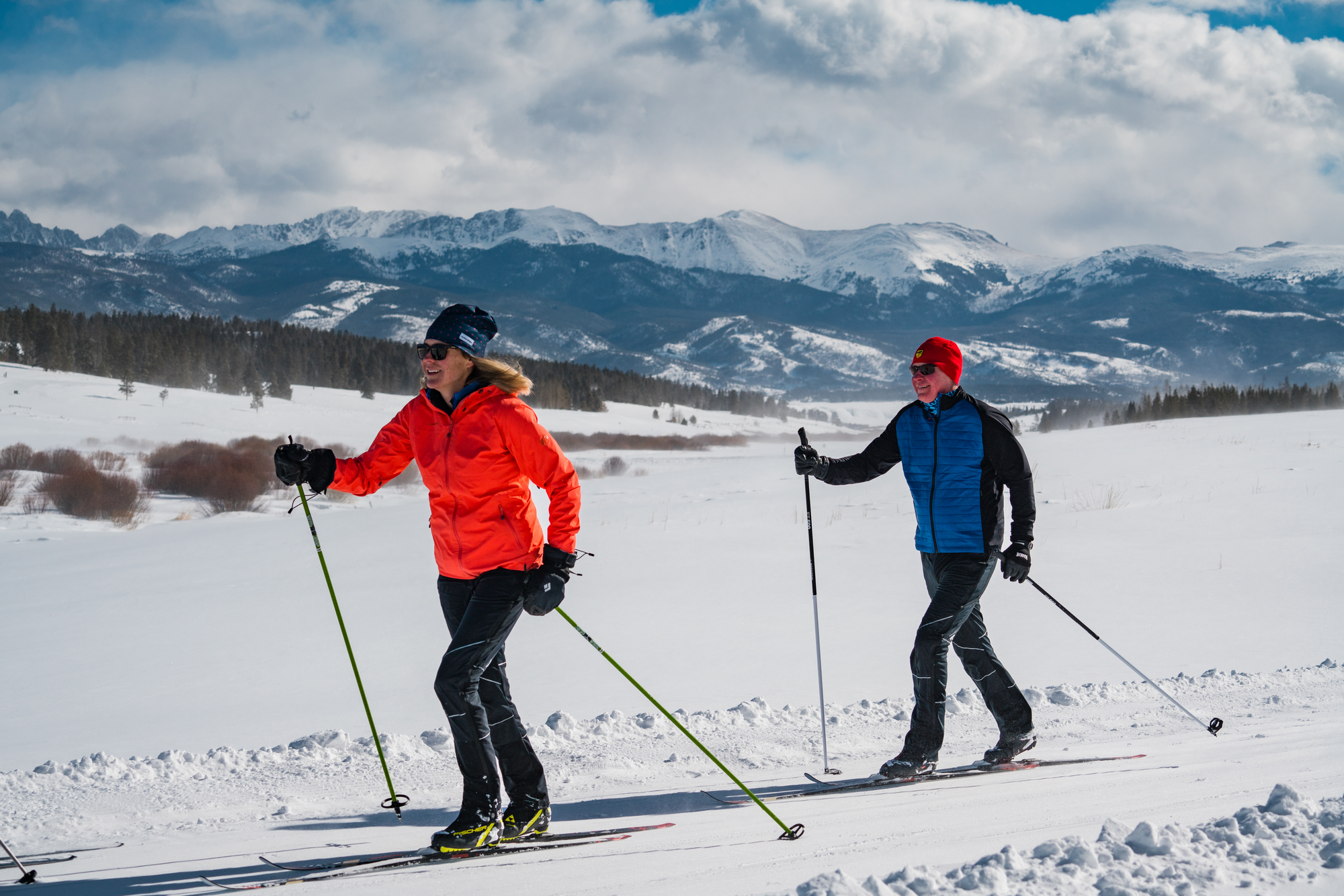 two people cross country skiing