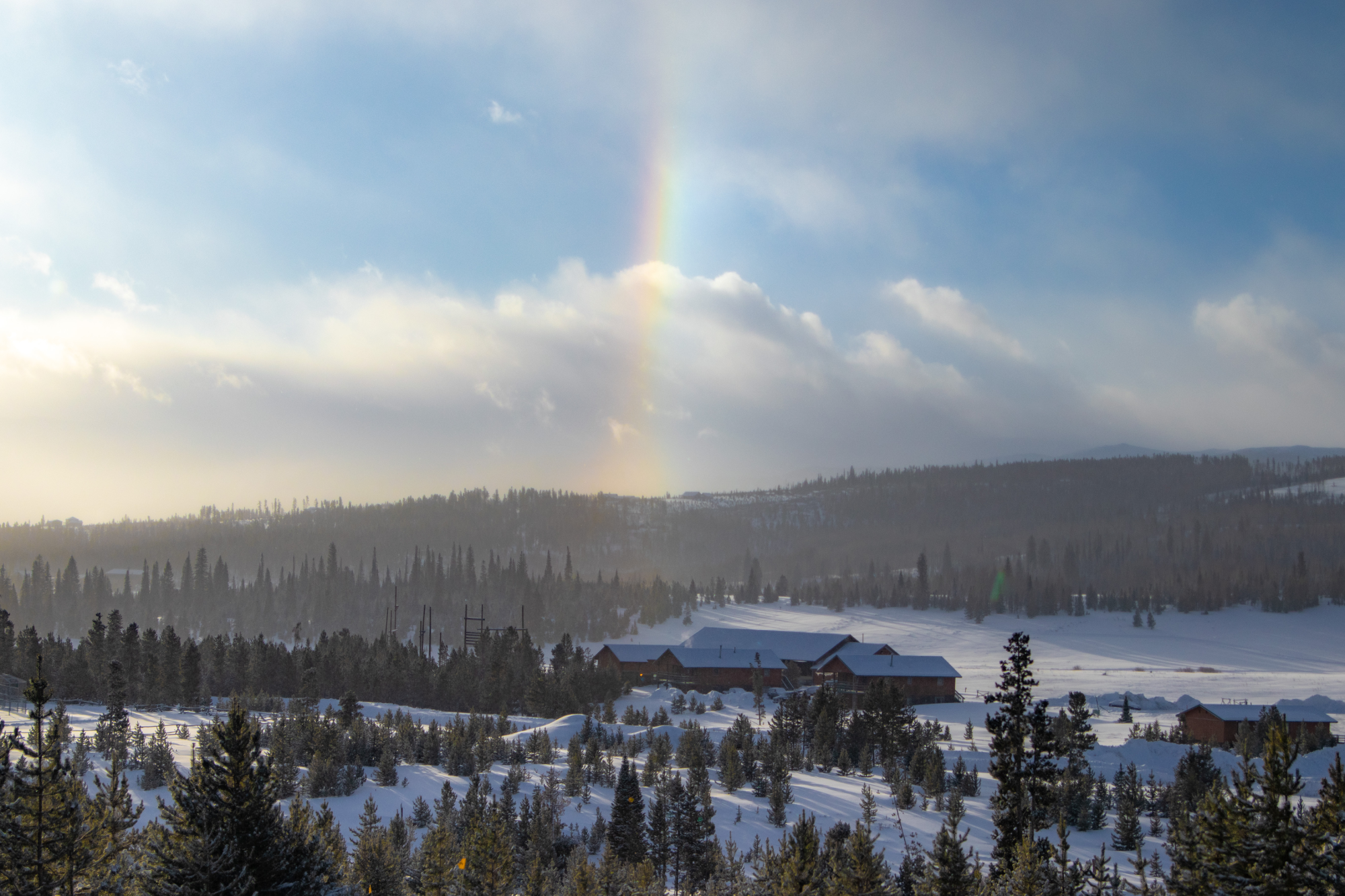 view of the rockies in the winter