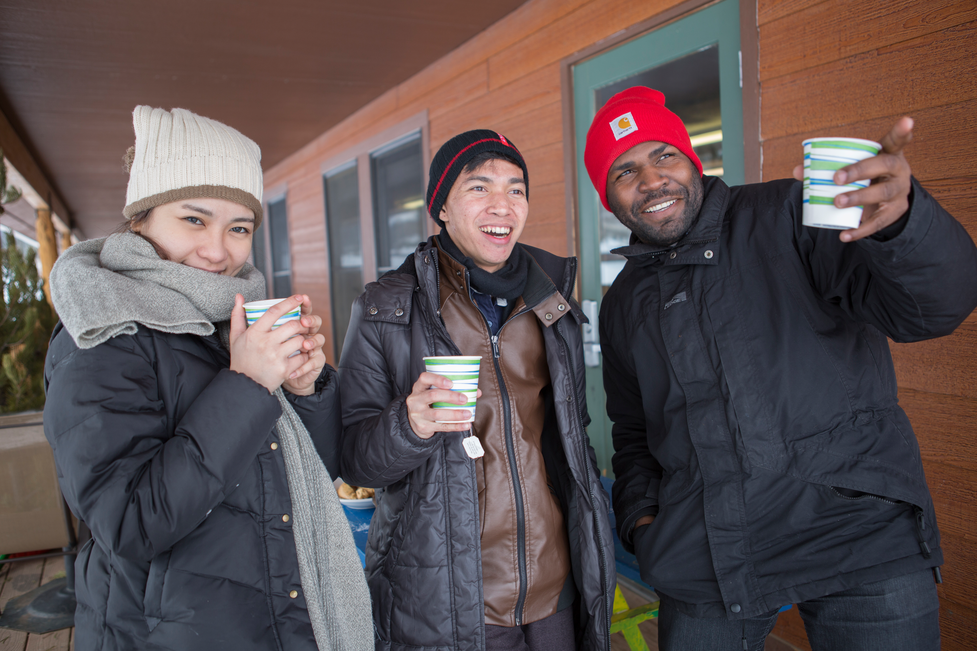 three people enjoying a coffee