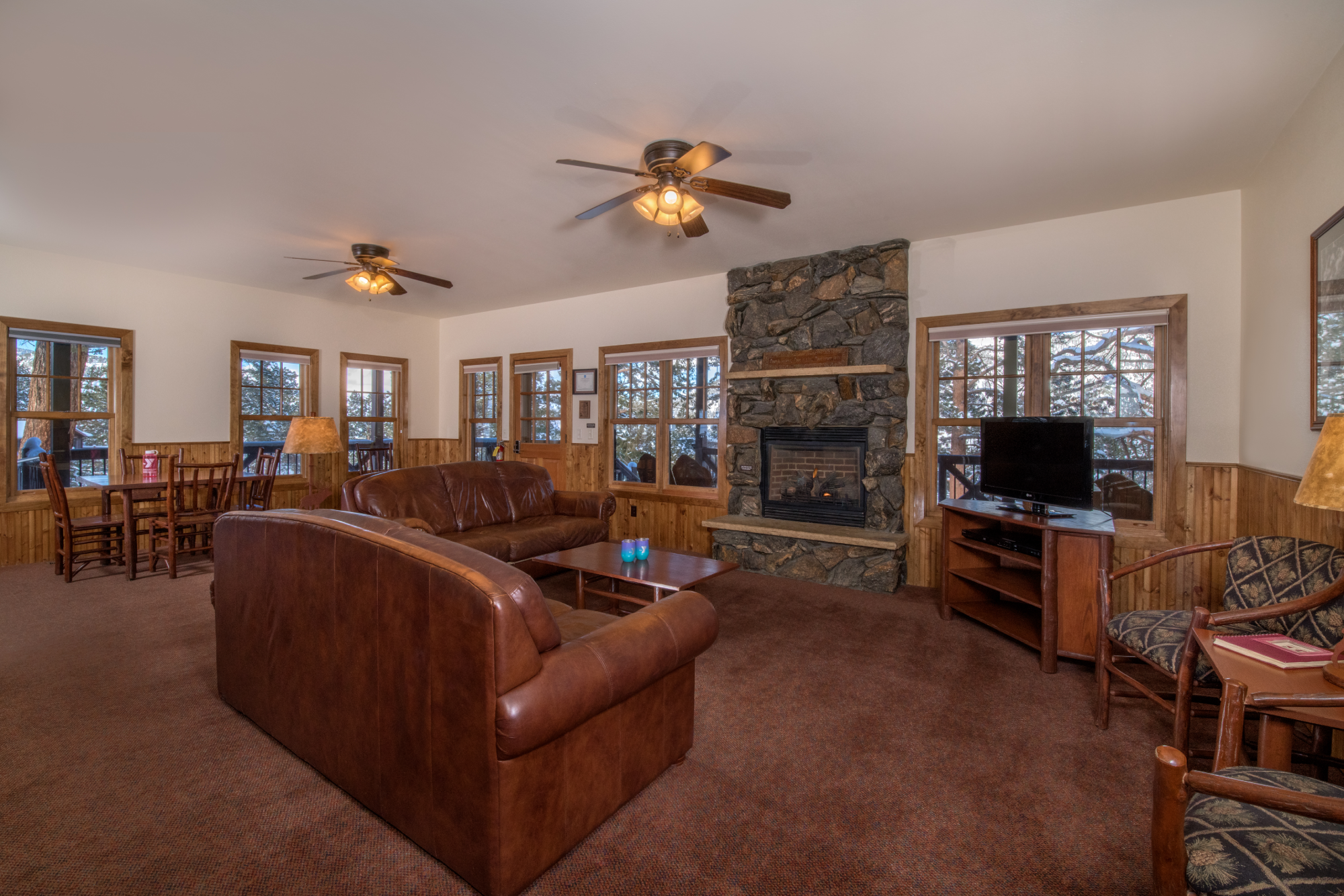 couch and fireplace in cabin