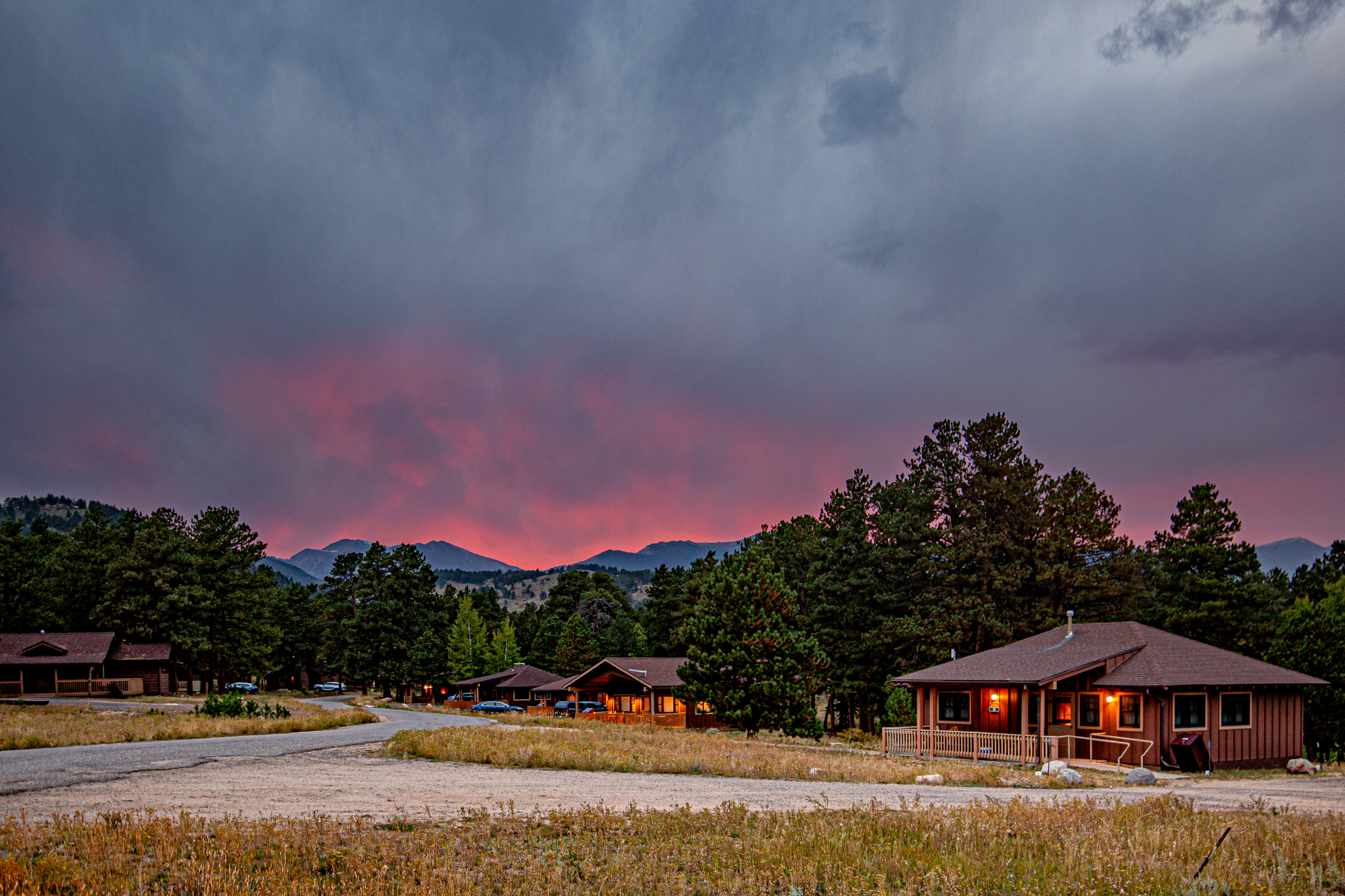 cabin and mountains during sunset