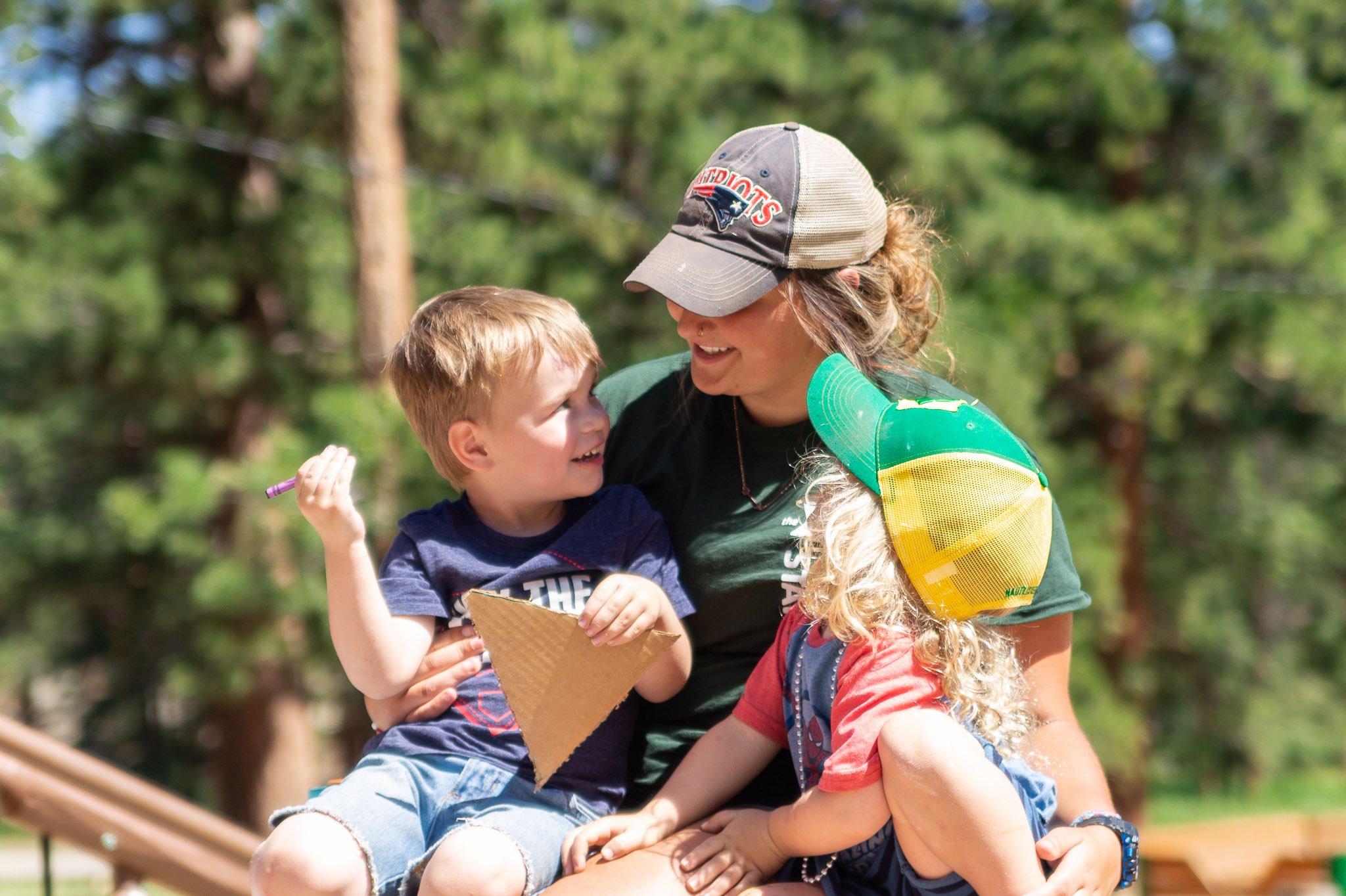 kids playing with woman