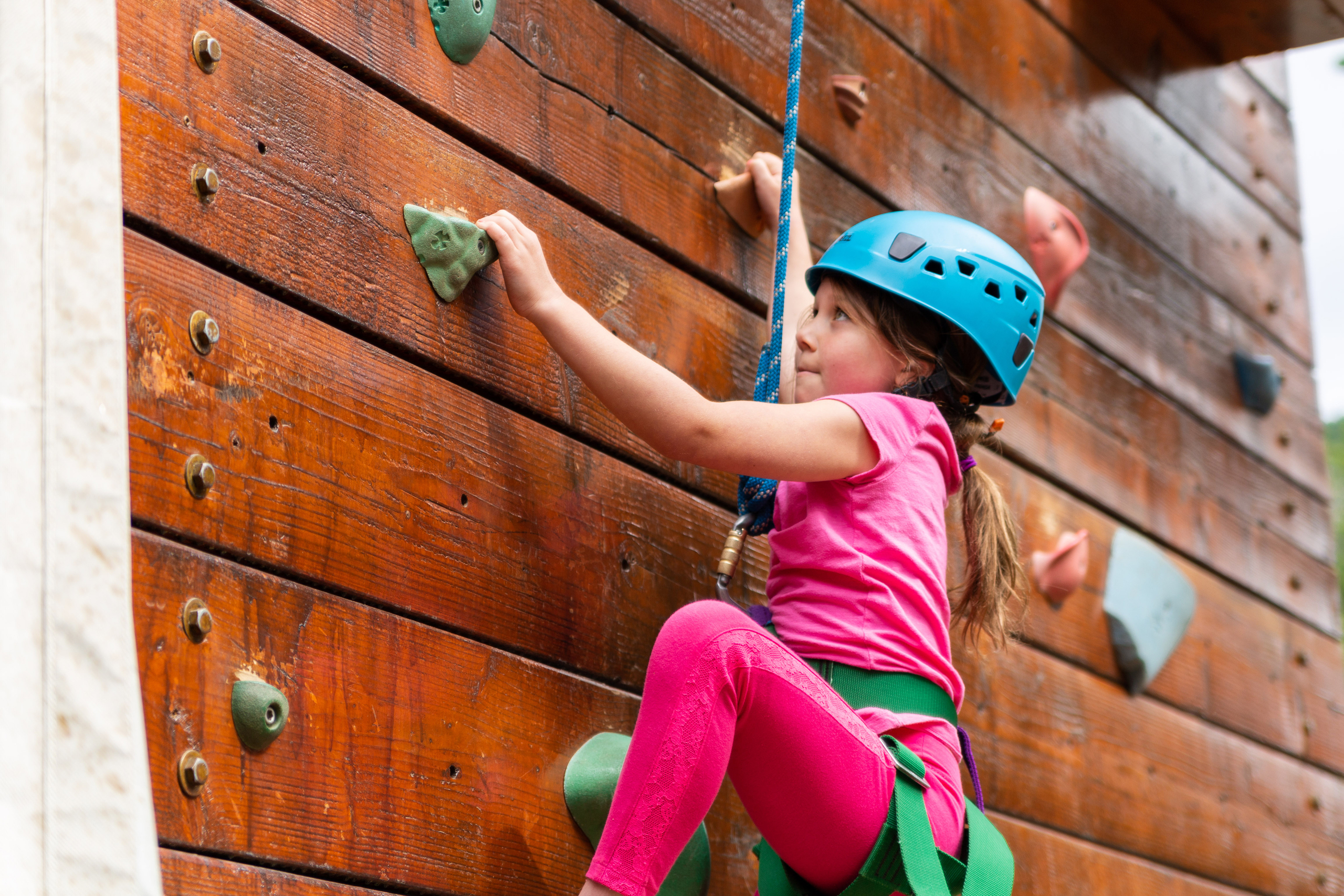 a child climbing a wall